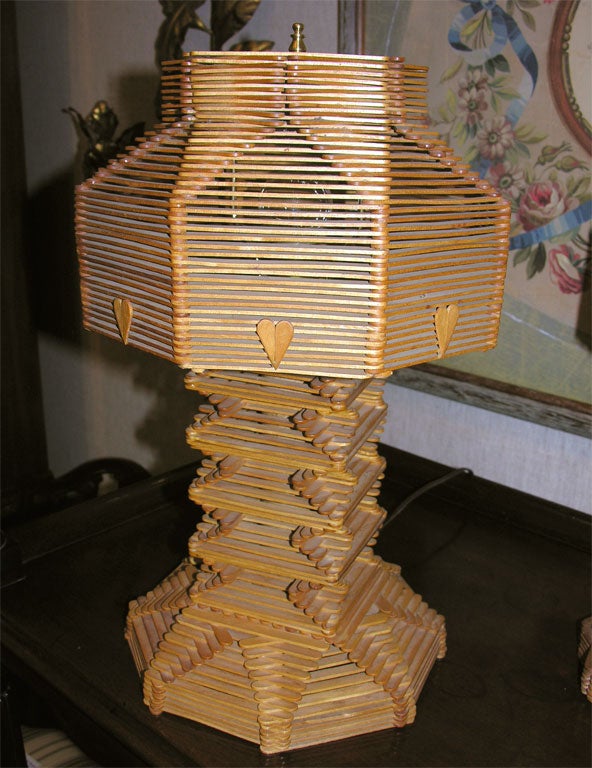 A Near Pair of American Vernacular “Popsicle Stick” Lamps <br />
and Shades, Mid 20th Century <br />
<br />
18 inches Tall to Finial<br />
Base: 10 inches diameter