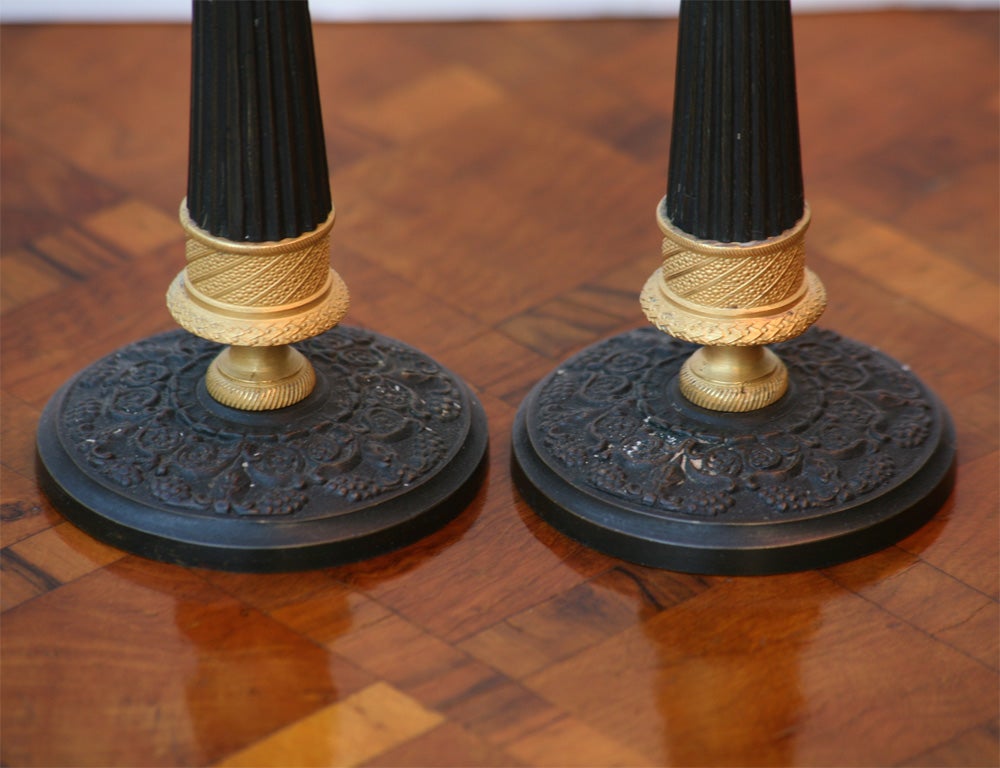Collection of Charles X Gilt and Patinated Bronze Candlesticks 1