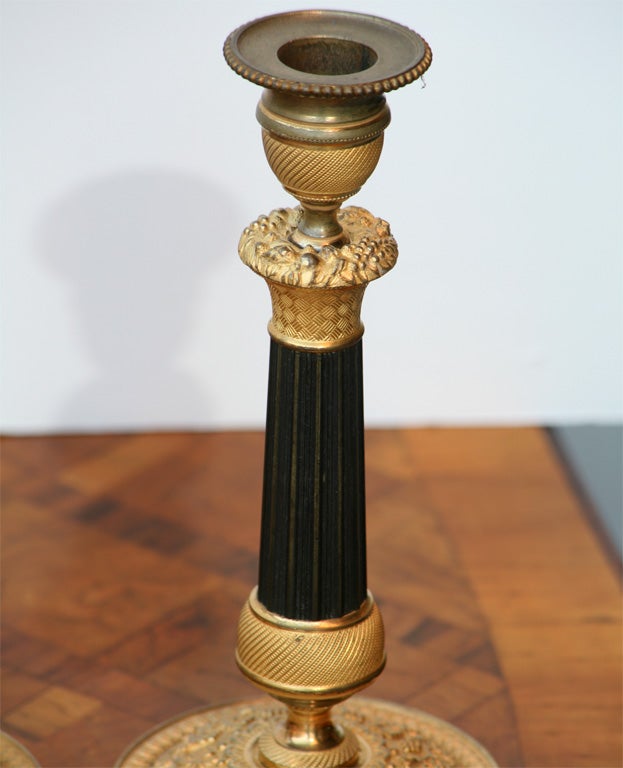 Collection of Charles X Gilt and Patinated Bronze Candlesticks 4