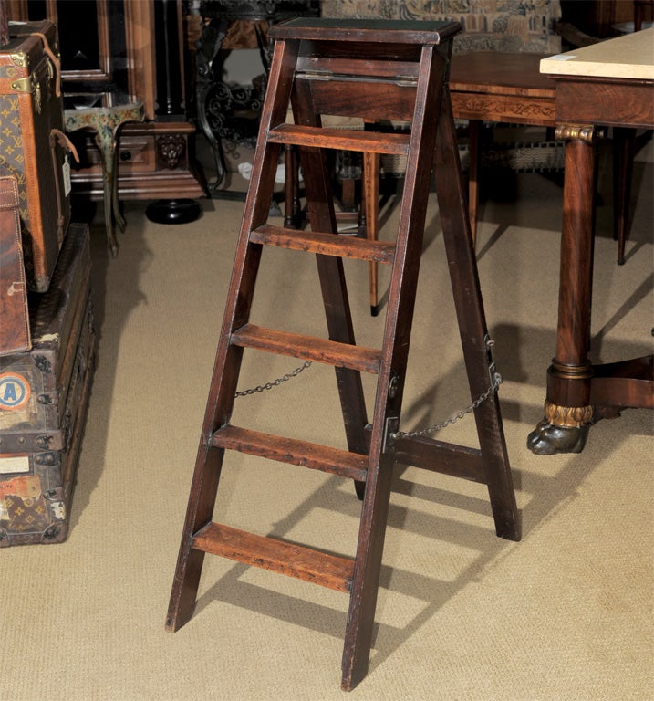 A rare English folding 19th century mahogany ladder.  Great compact size.  Less than 2% of our inventory is shown here please contact us  for specific searches.  Take a look at our own site for more listings and information.