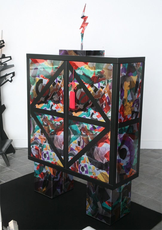 ALLESSANDRO MENDINI'S SCLUPTURED ZINC CABINET and DECOUPAGED ART WORK.  NUMBERED EDITION  2/9