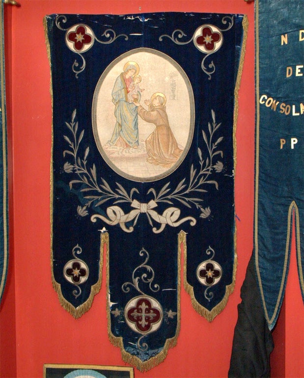 This banner has beautiful workmanship and would make beautiful pillows. The embroidery is done with metallic thread.