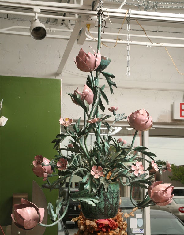 Seven armed chandelier by Garland with unusually beautiful form and color. The smaller flowers also light.