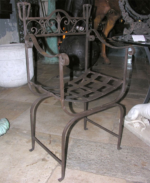 American, hand wrought iron chairs, circa 1920. One pair available, priced per pair.