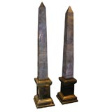 Pair of marble obelisks on brass plinth bases