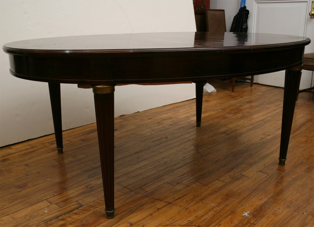 Mahogany dining table signed Jansen