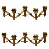 Pair of  articulated brass candlesticks by Pietro Chiesa
