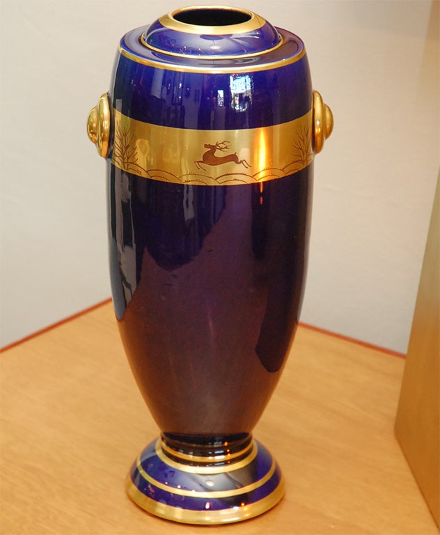 Elegant deep blue Art Deco ceramic vase with gold banding. Signed Maurice Pinon.