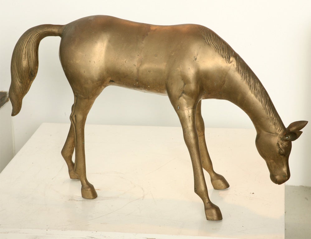 Elegantly modeled male and female horse figures in brass. Massively cast in sections and hand welded with superb finishing. Mellow overall patina adds depth. Great lines and detail.