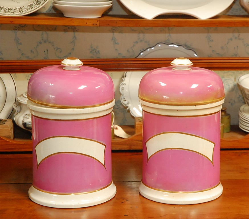 pair of china pharmacy jars  with liner lovely pink