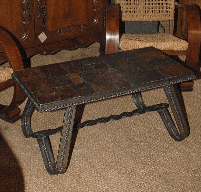 Art Deco iron coffee table by Charles Piguet