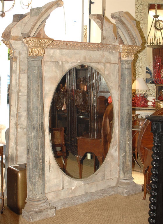 Enormous continental European mirror composed of antique elements (Two available, priced separately).