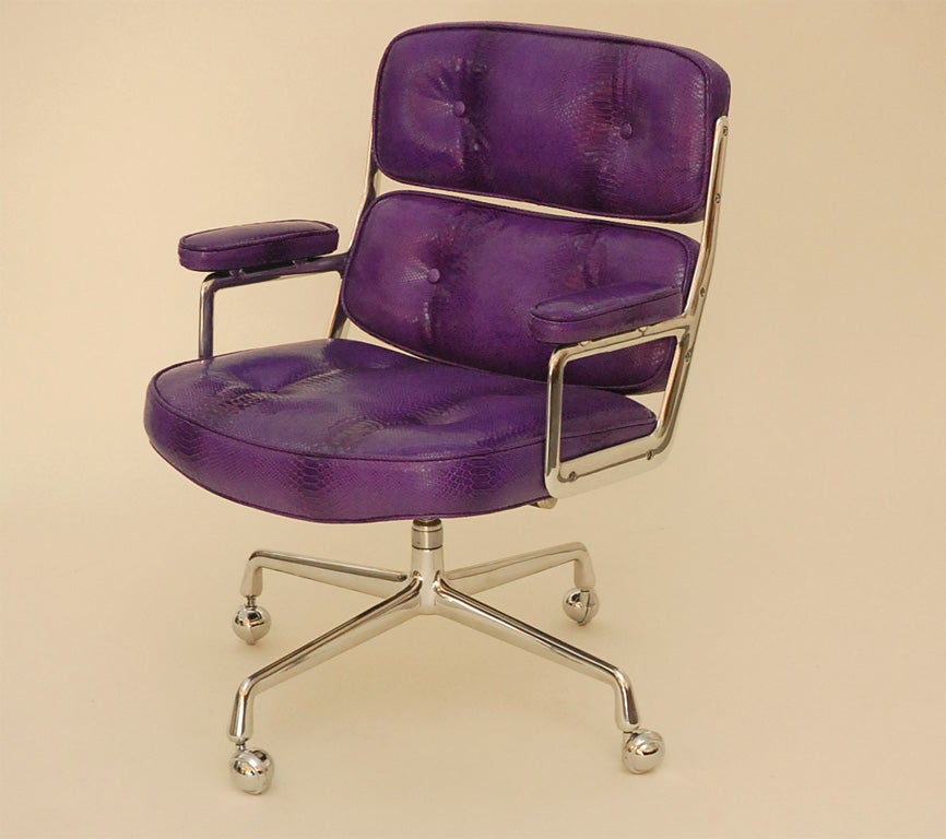 Classic office chair, from the Time Life building in New York. Designed by Eames. Newly upholstered in purple faux python leather with perfectly polished aluminum base. Only one available in this unique purple python leather. Multiple quantities of