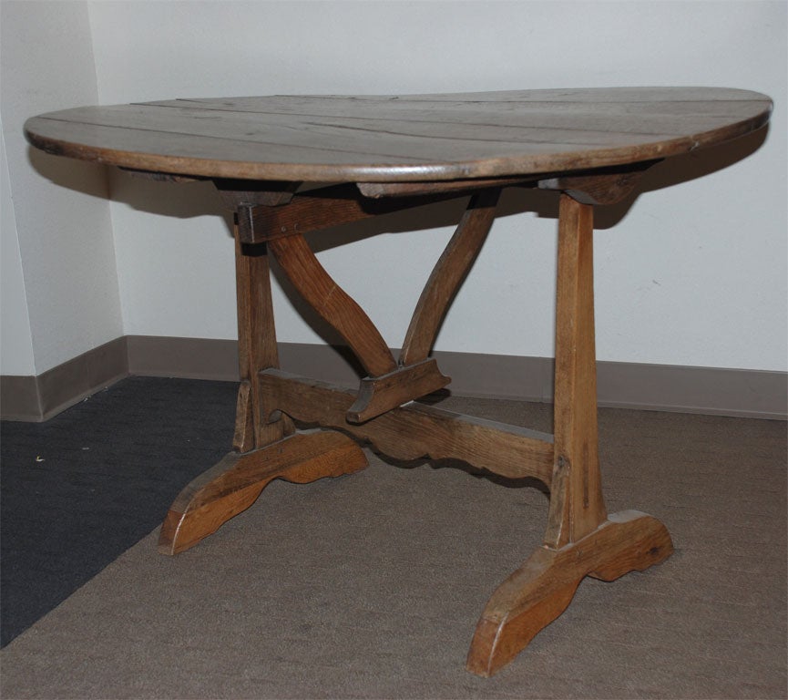 Oak wine tasting table with plank top.