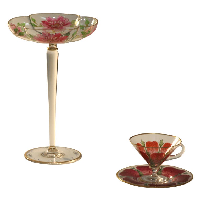Two examples of hand blown crystal decorative items. The tall and elegant compote is hand blown quatre-foil shaped with hand painted enamel in the  