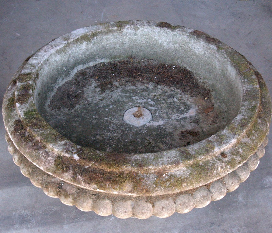 An English low circular bowl planter.
