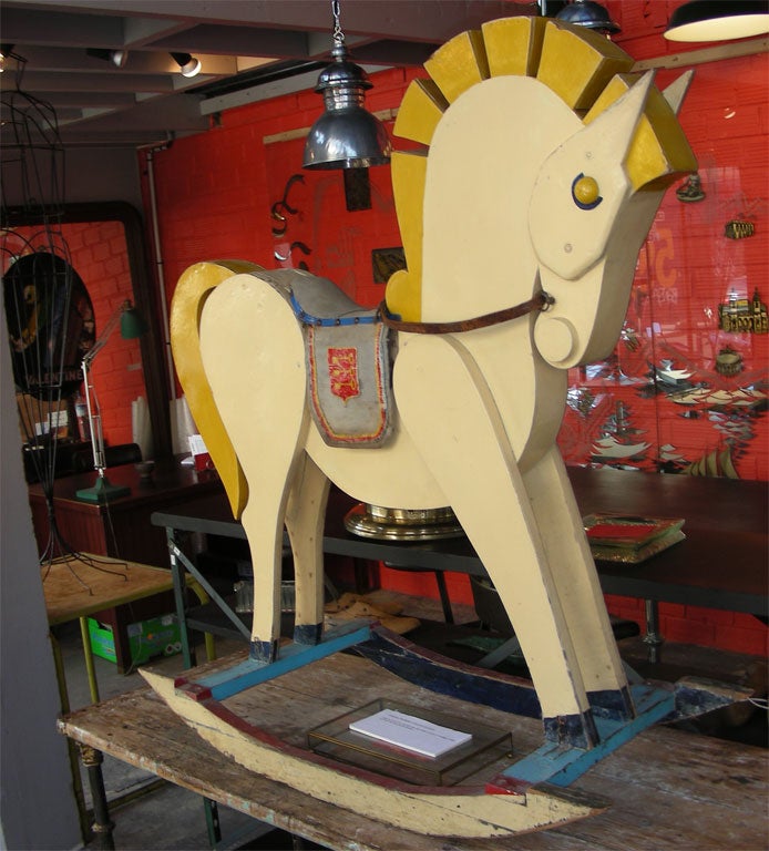 1950s rocking-horse in painted wood, fabric and leather, from the merry-go-round located at the lower end of the Champs Elysées in Paris. Made by Colette Gueden.