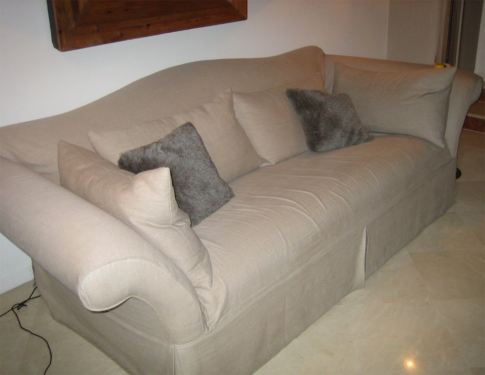 Two end of 20th century Belgian sofas, three-seater sofas, re-upholstered in linen.