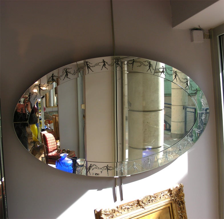 1970s Italian Murano mirror with frame decorated with dancing girls holding garlands.
