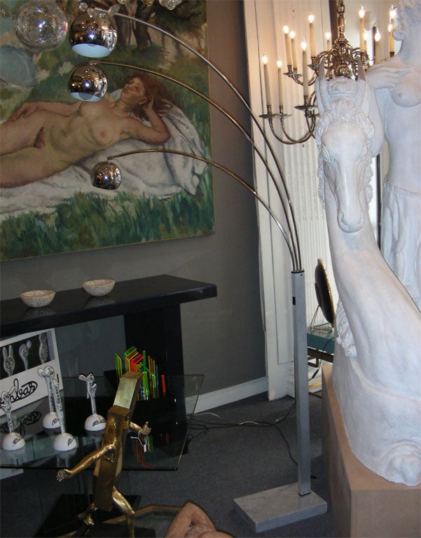 Two 1970s Italian floor lamps with three branches that can adjust and orient. Base in gray and white marble, shafts in chromed metal.