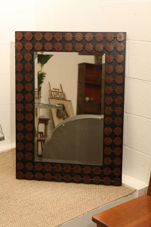 Linked copper disk mirror on an tetra negra oak frame