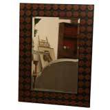 Linked copper disk mirror on an tetra negra oak frame