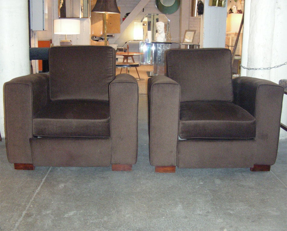 Two 1940s armchairs by Jacques Adnet in the original brown velvet.
