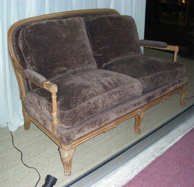 1950s sofa and two armchairs in beech wood, with feather pillows. Armchairs height 80/40 cm., length 65 cm., depth 80 cm.