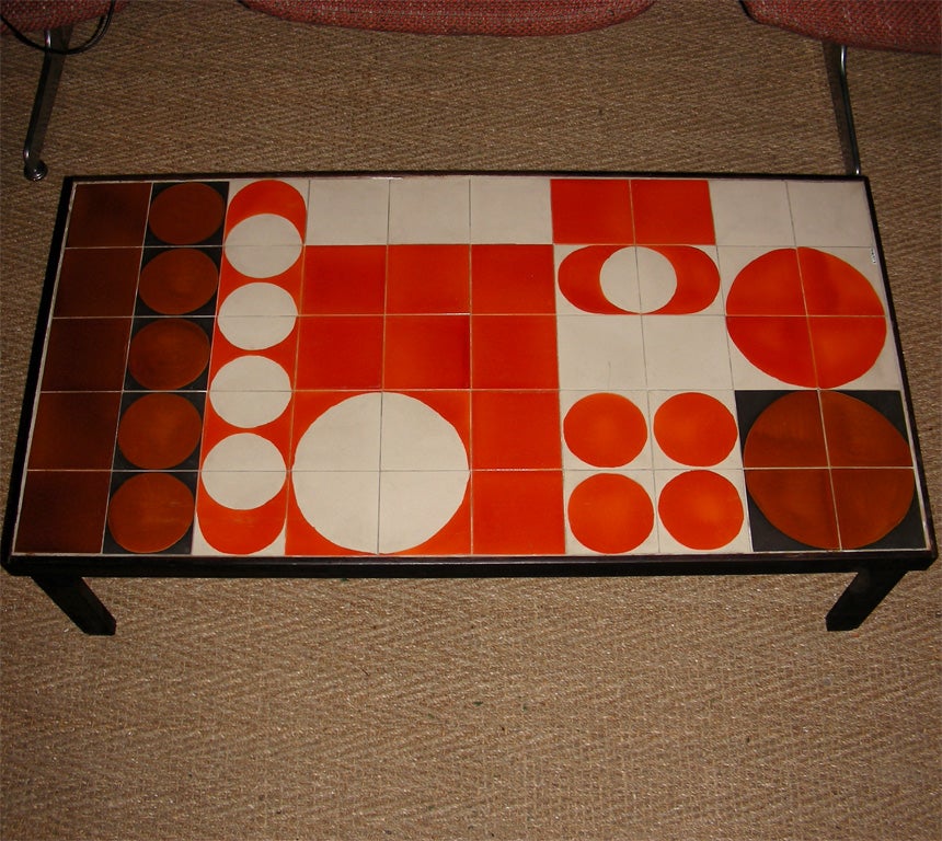 1965 coffee table by R. Capron with structure in metal and ceramic tiles on top surface.