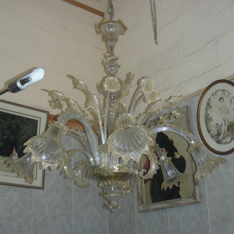 1950s Murano glass chandelier with six branches. Gold dust mixed into the glass paste.