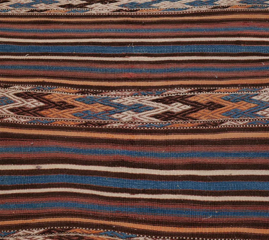 Kilim in tones of indigo, canteloupe, chocolate & cream