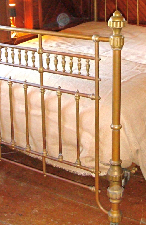 Unusual brass bed in mint condition. Can be easily modified to fit a queen mattress.