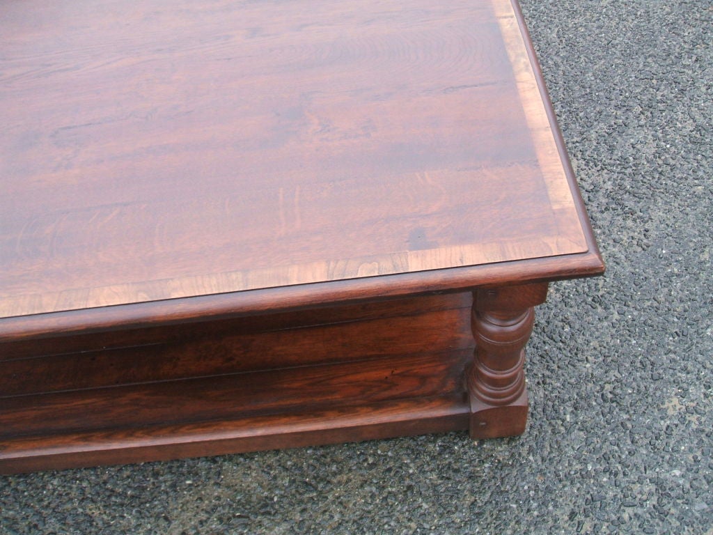 Square coffee table with shelf and contrasting banding.
