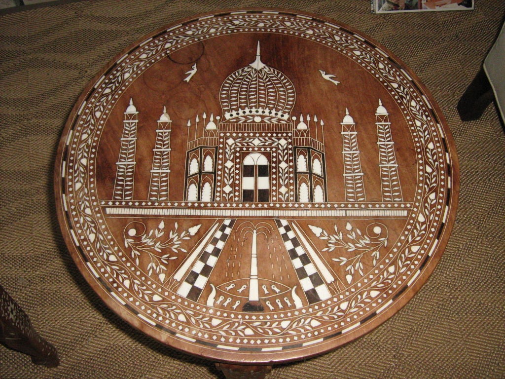 Mahogany with inlaid bone, Taj Mahal design, elephant legs <br />
Left table: 16