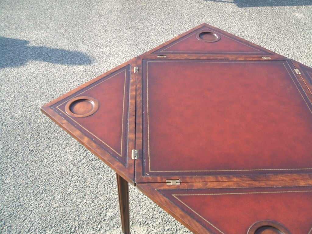 George III envelope top game table, opens to inset leather top.