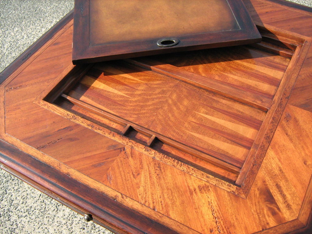 Game table with chess and backgammon pieces.