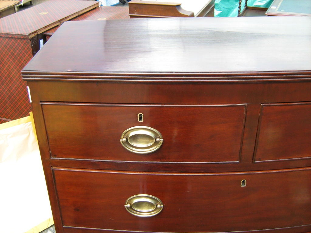 mahogany,five drawers chest with brass hardware.