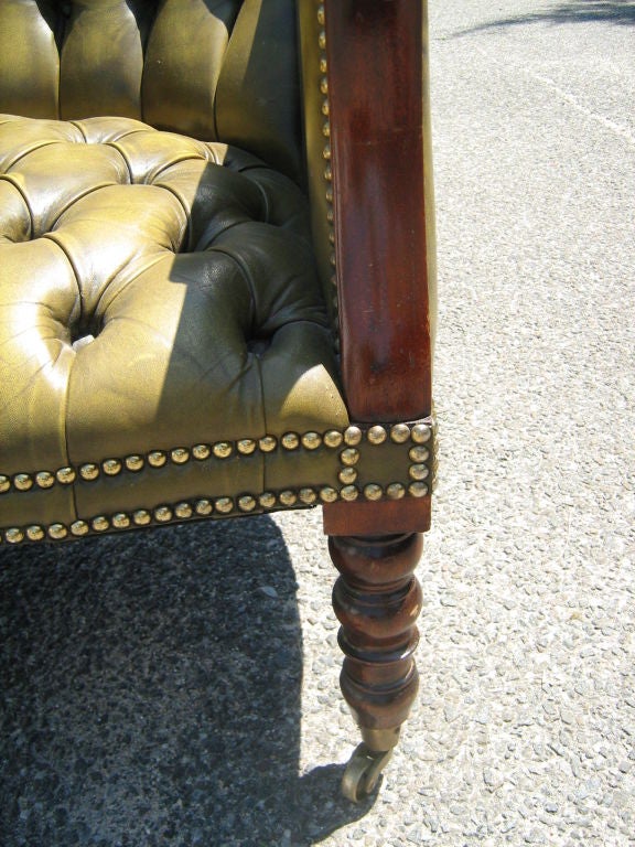 Leather arm chair with shelf In Good Condition For Sale In Bridgehampton, NY