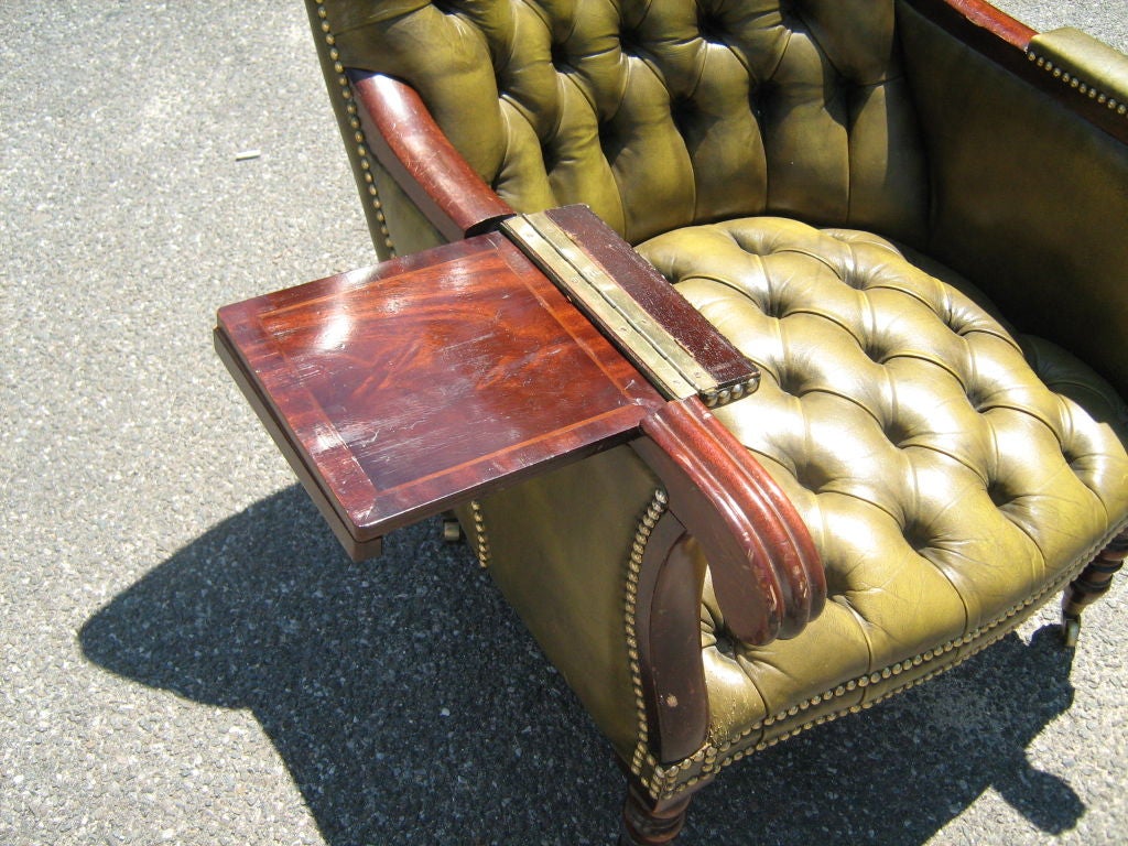 English Leather arm chair with shelf For Sale