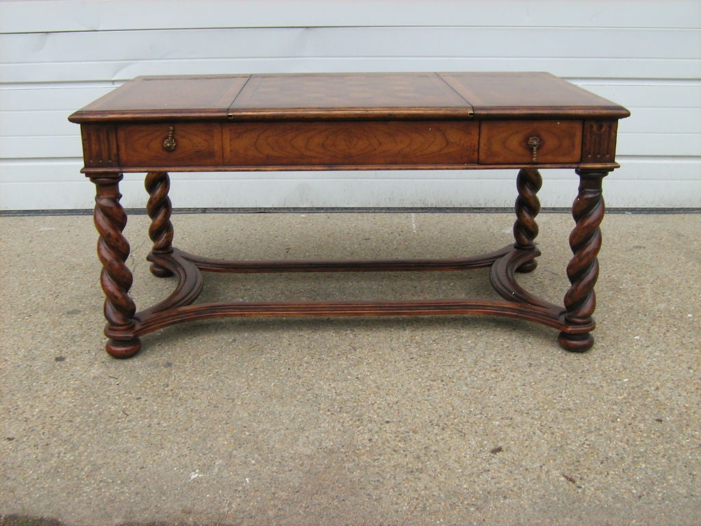 Parquetry top cocktail table with sliding chess and backgammon board on turned legs. Game pieces included.