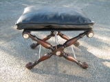 Leather cushion on claw foot stool