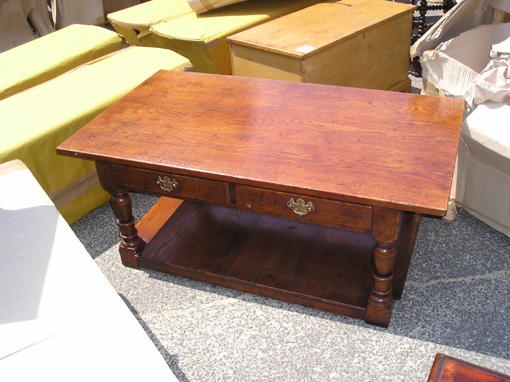 Custom-made, oak coffee table with potboard and two small drawers. Custom finish and size available.