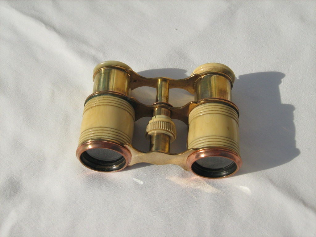 Unique collection of antique binoculars $295.00,opera glasses with leather case $115.00 and telescopes $165.00.Sold separately.