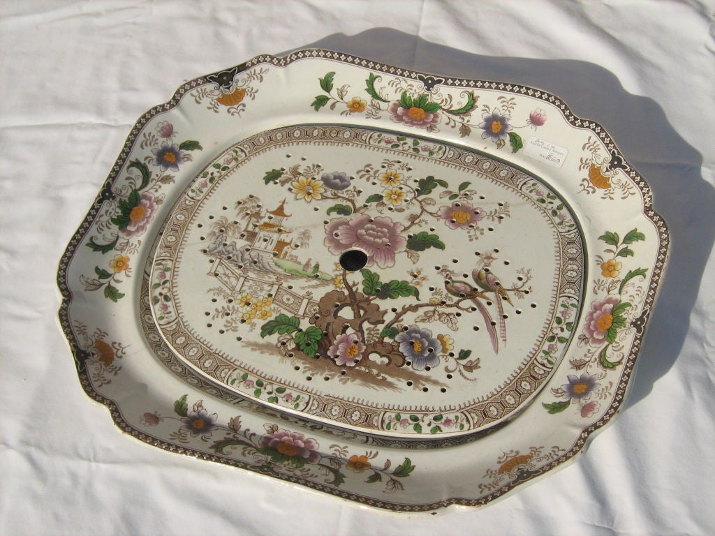 decorative carving platter with strainer.