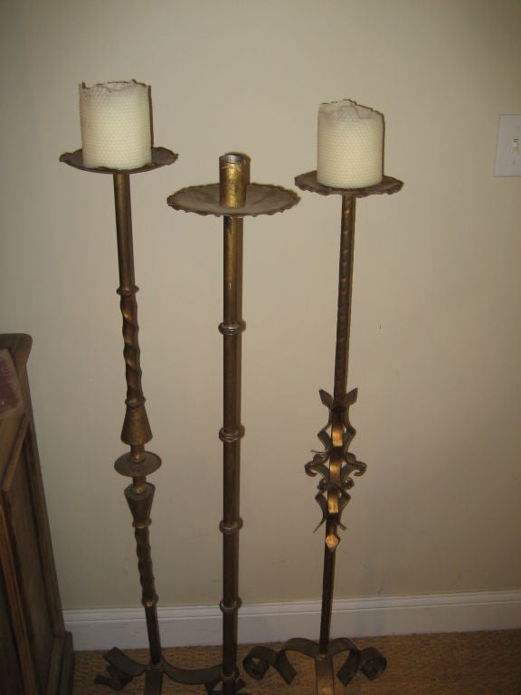 Three Torcheres/ Candlesticks
