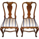 Pair of oak shell motif chairs