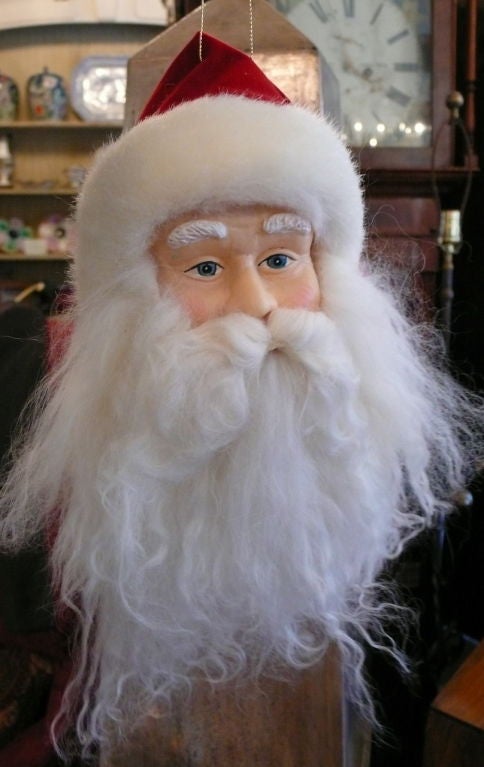 Unusual Hand Painted Faces of Santa Claus, Lambs Wools Beards,With a bell on each cap<br />
Sold Individually