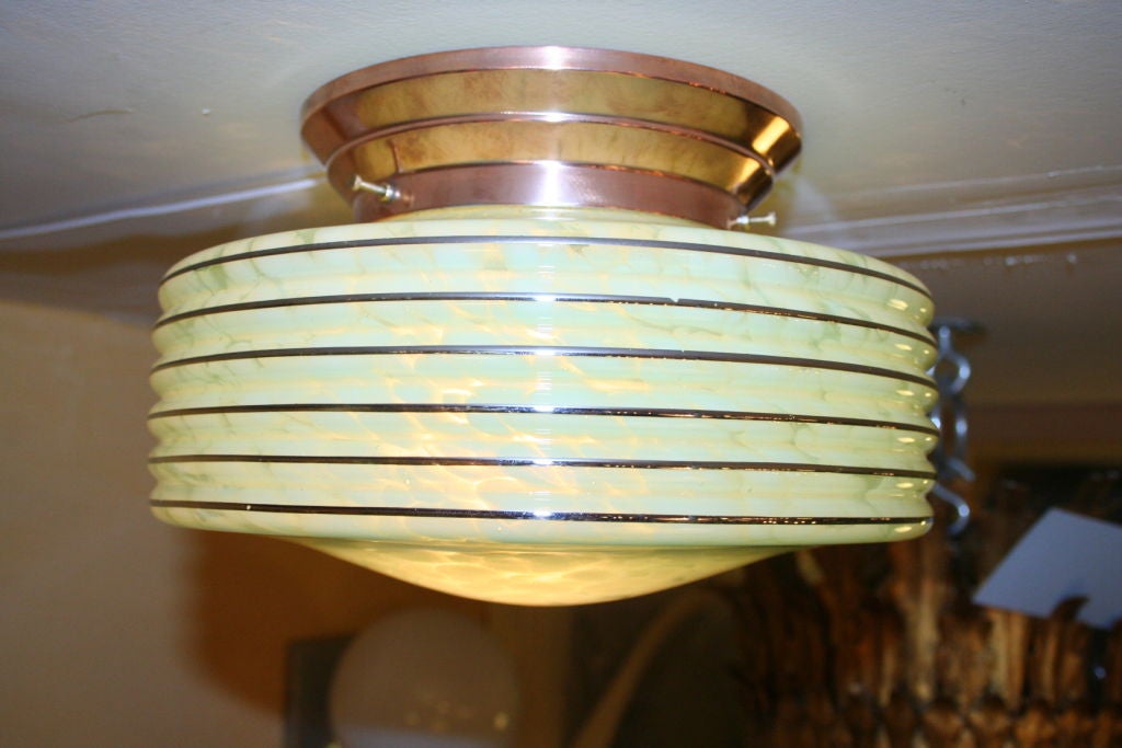 Small mottled green opaline glass ceiling fixture with copper base
