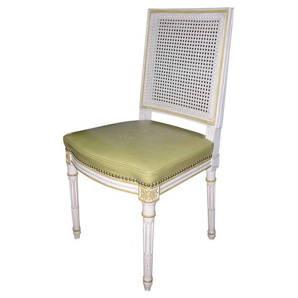 Set of Fourteen Louis XVI Style Cane Dining Chairs by Jansen For Sale