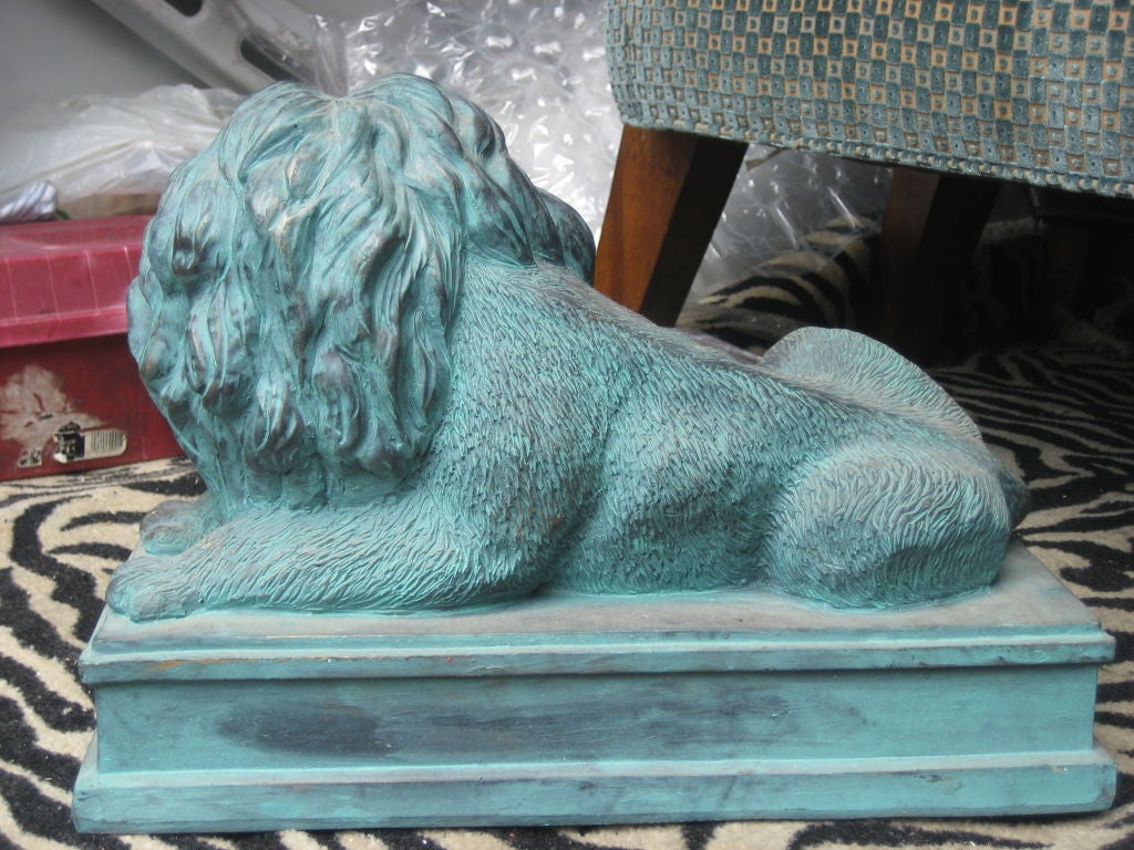 A pair of cast lion figures. Great finish.